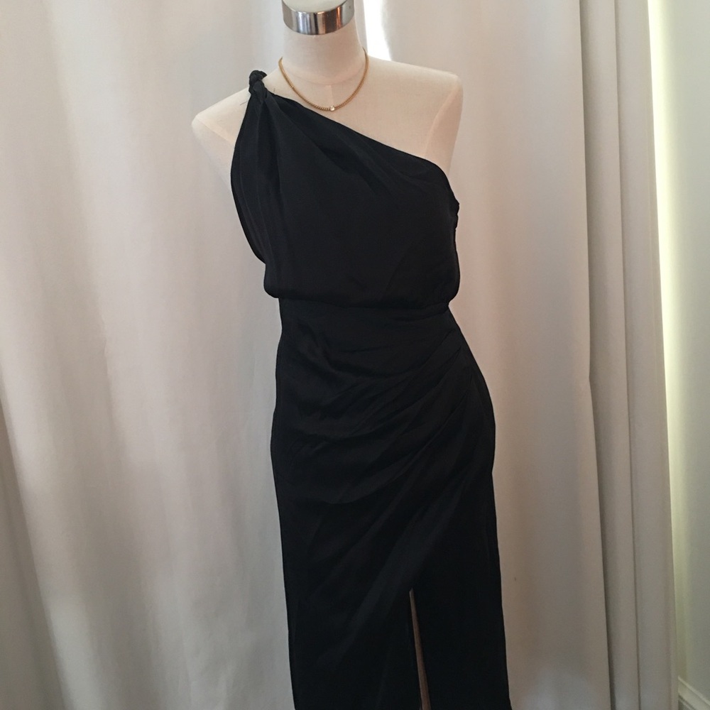 Black satin Anthropologie one shoulder dress. Very flattering with an open back
